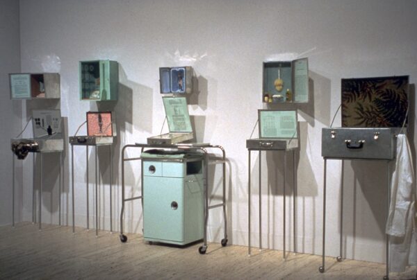 An installation of Medical Series, featuring several cabinets and vitrines.
