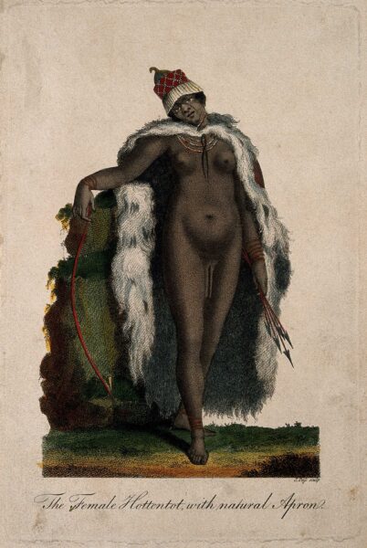 An engraving of a nude Black woman wearing an elaborate cloak, necklace, and hat. She holds several arrows in her left hand and a bow in her right hand; her labia are visibly elongated. The page is labeled "The Female Hottentot with natural Apron" below.